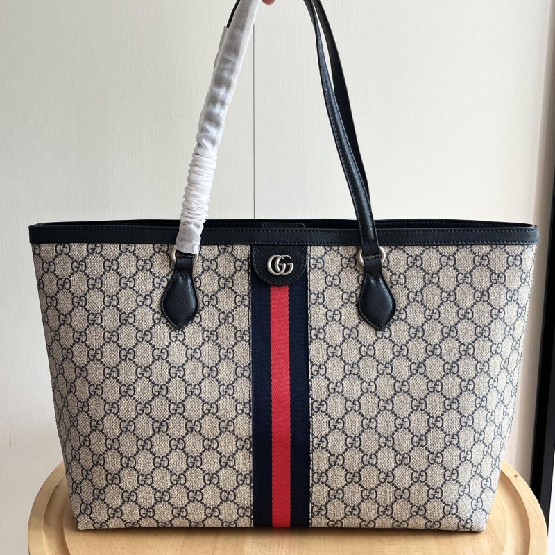 G*u*i shopping bags